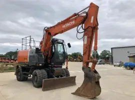 Зображення для оголошення Колесный экскаватор Hitachi ZX 140 W-3. Экскаватор б/у