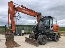 Зображення для оголошення Колесный экскаватор Hitachi ZX 140 W-3. Колесный экскаватор б/у