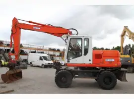 Зображення для оголошення Колесный экскаватор CAT M315