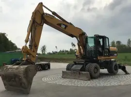 Зображення для оголошення Колесный экскаватор CATERPILLAR M322С 2006 г