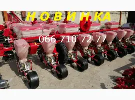 Сівалка пневматична (привідні колеса між секціями)точного висіву УПС-8-03 на фото УПС