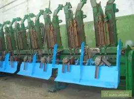 Установка измельчителя на кукурузные жатки John Deere