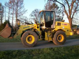 Зображення для оголошення Фронтальный погрузчик New Holland W130