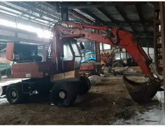 Полноповоротный колесный экскаватор ATLAS 1304
