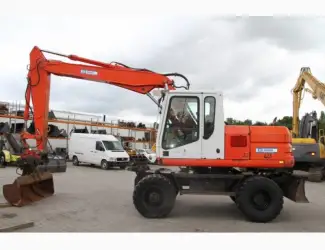 Колесный экскаватор CAT M315
