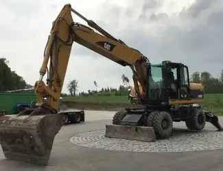 Колесный экскаватор CATERPILLAR M322С 2006 г
