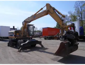 Колесный экскаватор Caterpillar M 315 в Украине