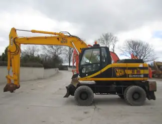 Колесный экскаватор JCB JS 200W. Купить экскаватор б/у