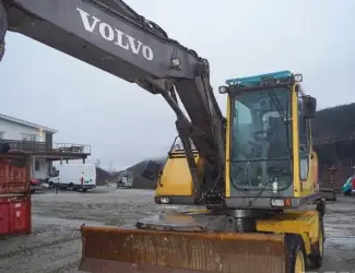Колесный экскаватор Volvo EW140B в Украине