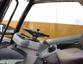 Зображення для оголошення Телескопический погрузчик CATERPILLAR TH330B 4x4x4 2007 года