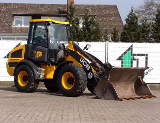 Зображення для оголошення Фронтальный погрузчик JCB 409