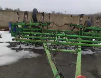 Культиватор причіпний John Deere - 1010 _ 8м