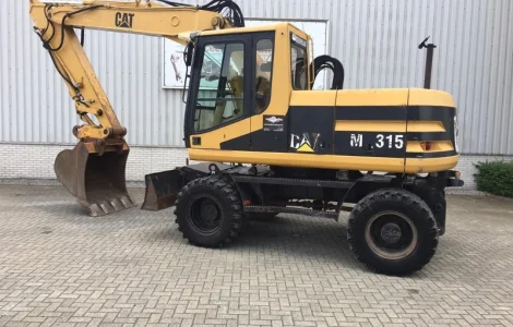Колесный экскаватор Caterpillar M315