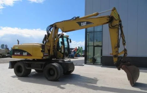 Колёсный экскаватор Caterpillar M316C 2003 года