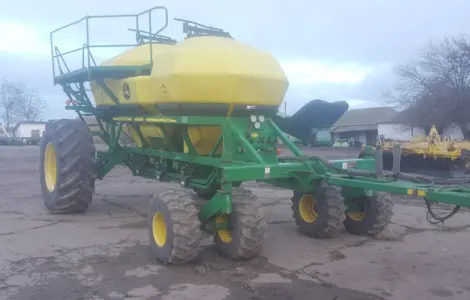 Бункер пневмоприцеп John Deere 1910 в продажу