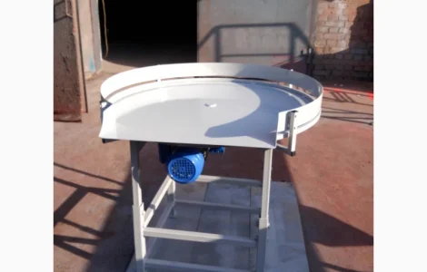 Конвеєр і стіл нопичення. Поворотний сті