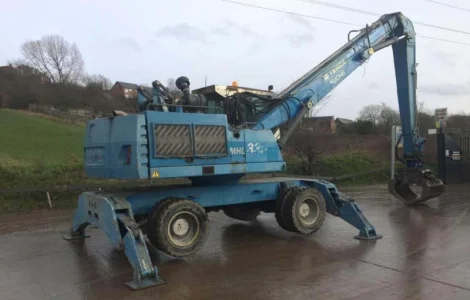 Грейферный перегружатель Fuchs MHL 335