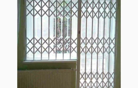 Розсувні ґрати Prof на балконний блок