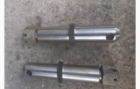 Палец автосцепки Т-150 с гайкой