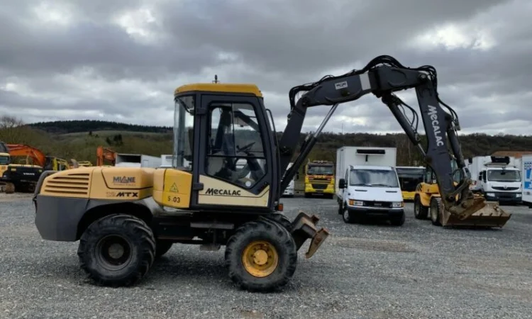 Экскаватор-погрузчик Mecalac 12 MXT - фото № 1