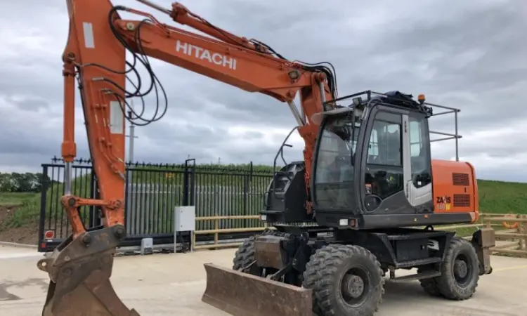 Колесный экскаватор Hitachi ZX 140 W-3. Колесный экскаватор б/у - фото № 1