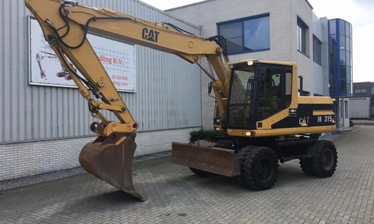 Колесный экскаватор Caterpillar M315 - фото № 2