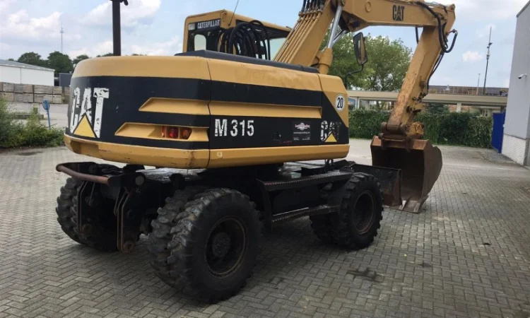 Колесный экскаватор Caterpillar M315 - фото № 3