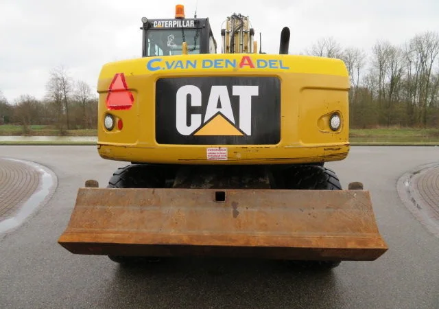Колесный экскаватор Caterpillar M313D - фото № 2