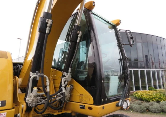 Колесный экскаватор Caterpillar M313D - фото № 7