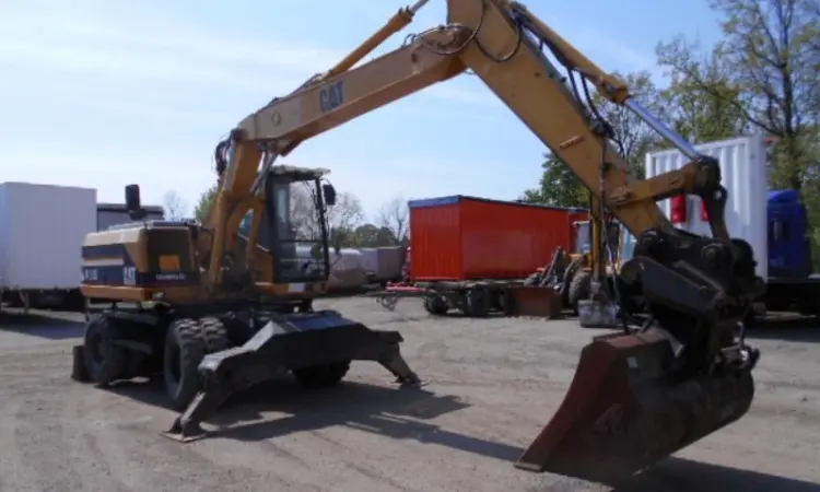 Колесный экскаватор Caterpillar M 315 в Украине - фото № 1