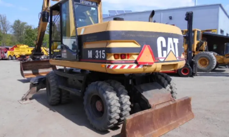 Колесный экскаватор Caterpillar M 315 в Украине - фото № 2