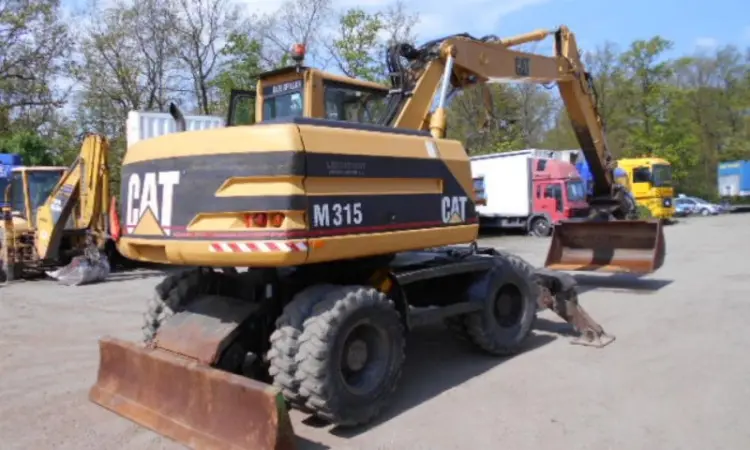 Колесный экскаватор Caterpillar M 315 в Украине - фото № 5