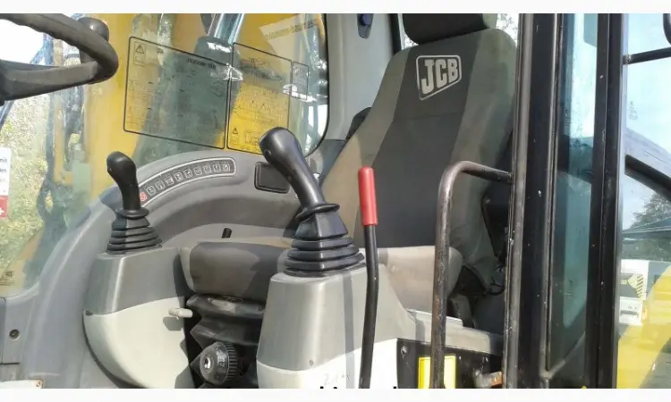 Колесный экскаватор. Колесный экскаватор JCB JS 200W - фото № 2