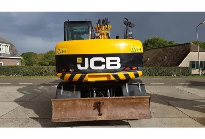Колесный экскаватор JCB JS145W. В наличии и под заказ - фото № 5