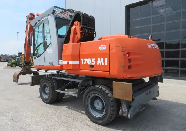 Колесный экскаватор Atlas Terex 1705MI - фото № 11