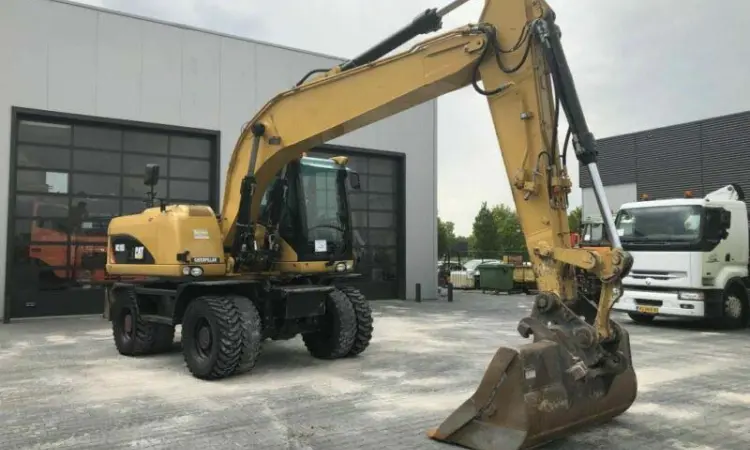 Колесный экскаватор Caterpillar M318D 2008 года - фото № 1