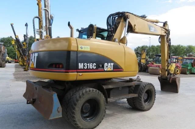 Колёсный экскаватор Caterpillar M316C 2003 года - фото № 4