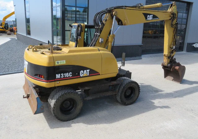 Колёсный экскаватор Caterpillar M316C 2003 года - фото № 5
