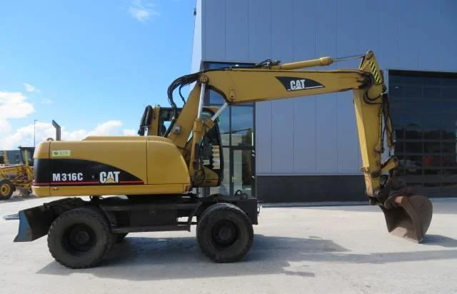 Колёсный экскаватор Caterpillar M316C 2003 года - фото № 8