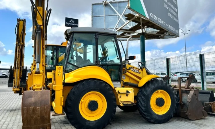 Екскаватор- навантажувач New Holland B115 - 2009 рік - фото № 3