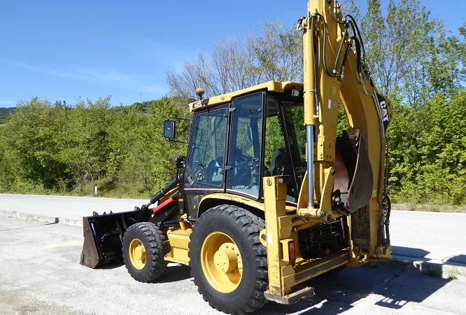 Экскаватор-погрузчик Caterpillar 442 D - фото № 18