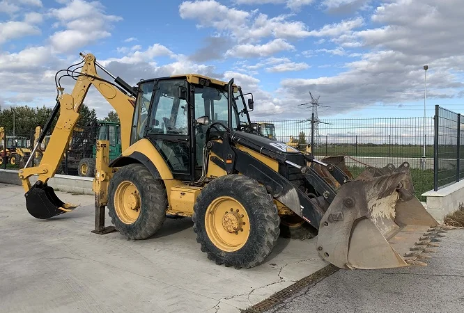 Экскаватор-погрузчик Caterpillar 434 - фото № 1
