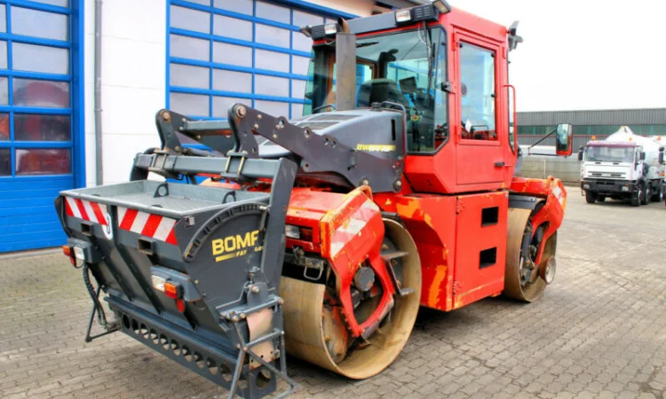 Комбинированный каток Bomag BW 174 AD-2M. Каток Bomag с разбрасывателем - фото № 1