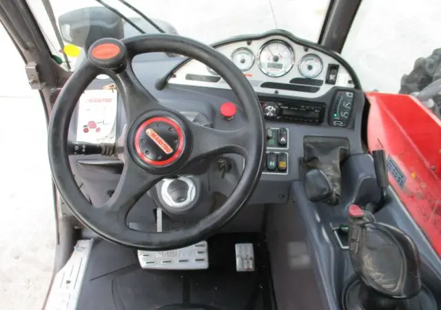 Телескопический погрузчик Manitou MLT 634-120 LSU. Строительная техника б/у - фото № 16