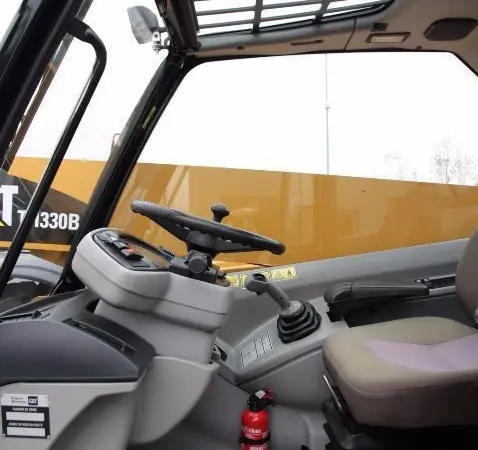 Телескопический погрузчик CATERPILLAR TH330B 4x4x4 2007 года - фото № 1
