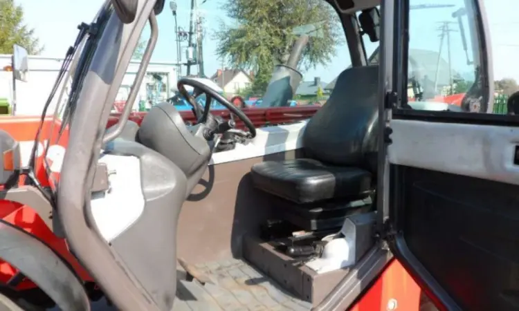 Телескопический погрузчик Manitou MT 732 2002 года - фото № 10