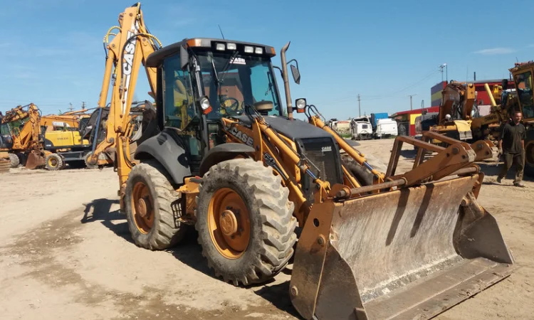 Экскаватор-погрузчик Case 695SR 2009 года - фото № 1