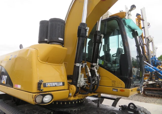 Грейферный перегружатель Caterpillar M318D на продажу - фото № 11