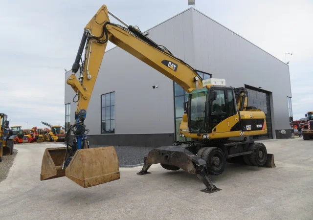 Грейферный перегружатель Caterpillar M318D на продажу - фото № 7