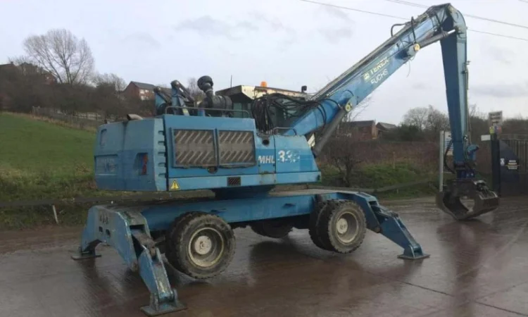 Грейферний перевантажувач Fuchs MHL 335 у продажу - фото № 1